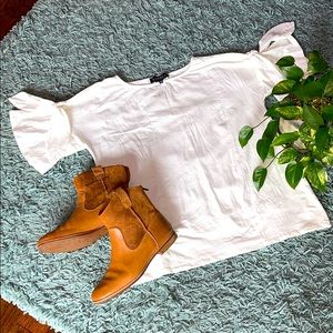 White Eloquii top with ruffle sleeves and tie